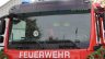 Symbolbild_Blaulicht_Feuerwehr_Auto_Schriftzug